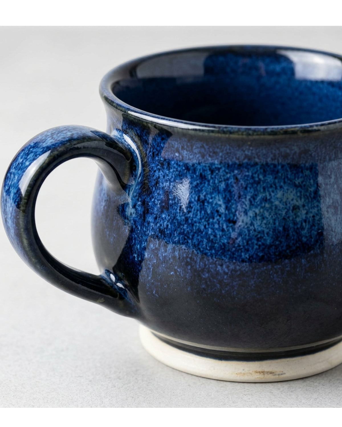 Fdgwm Reactive Glaze Coffee Mug 12 oz Midnight Blue - Detail view